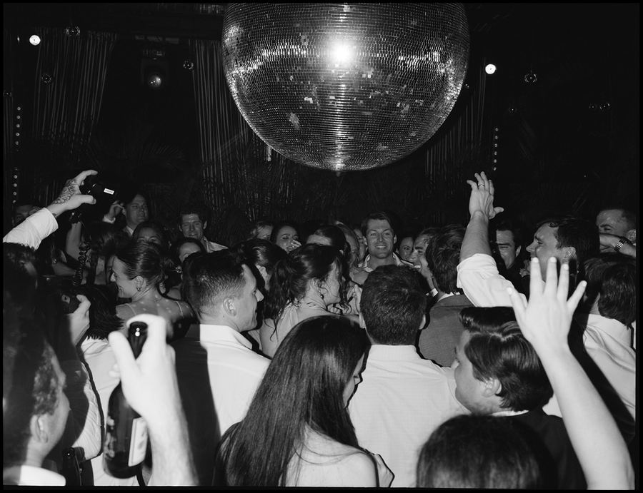 Guests dancing under the disco ball