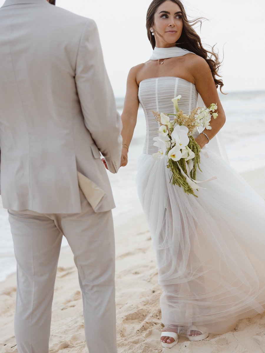 Allie & Ryan barefoot on the beach in Tulum