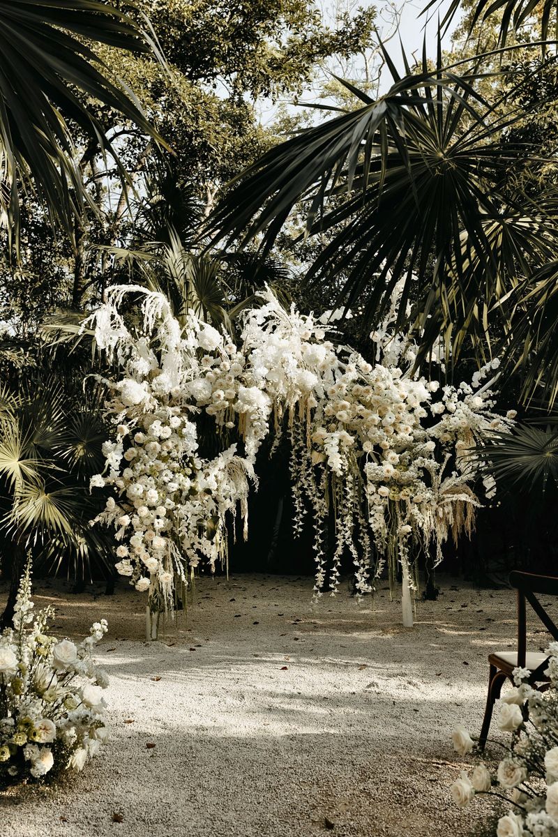 White floral ceremony · Tulum