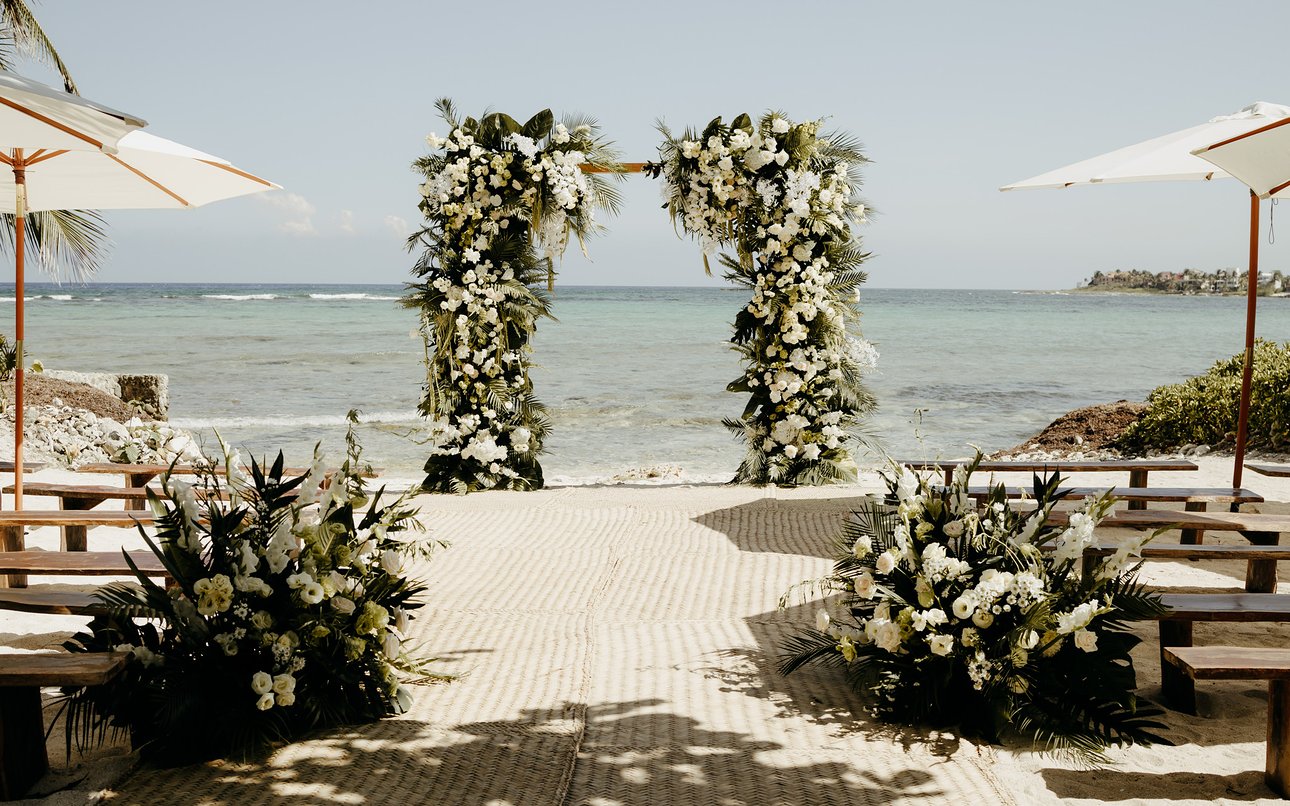 Floral altar facing the Caribbean in Tulum
