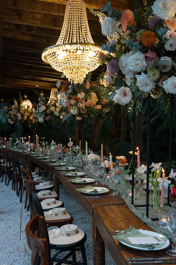 Long tables under crystal chandeliers at Vesica