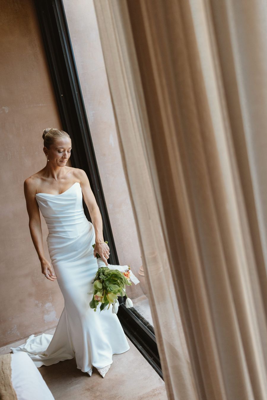 Bride by the window at Vesica, Tulum