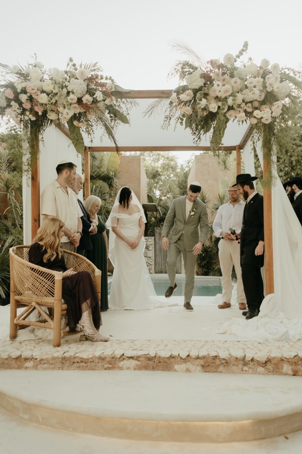 Meital & Shmulik's chuppah ceremony by the pool at Najil Chak